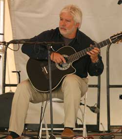 Image of Joe playing classical guitar
